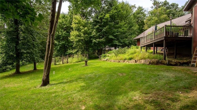 view of yard featuring a wooden deck