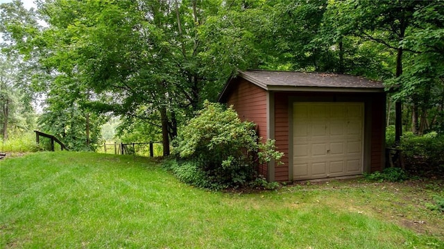 garage with fence