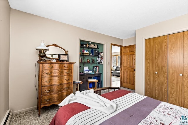 bedroom featuring a closet, baseboards, baseboard heating, and carpet flooring