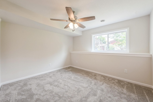 601 Harry Davis Ln, Minneapolis, MN 55411 - carpeted empty room with a ceiling fan, baseboards, and a smoke detector