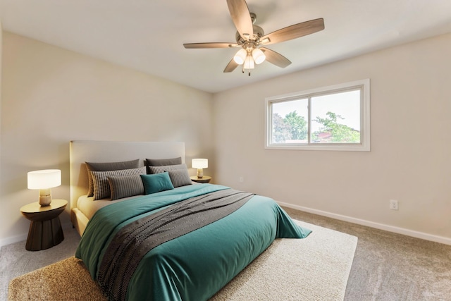 601 Harry Davis Ln, Minneapolis, MN 55411 - bedroom featuring carpet flooring, baseboards, and a ceiling fan