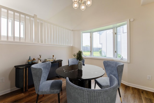 601 Harry Davis Ln, Minneapolis, MN 55411 - dining space featuring wood finished floors, a chandelier, baseboards, and vaulted ceiling