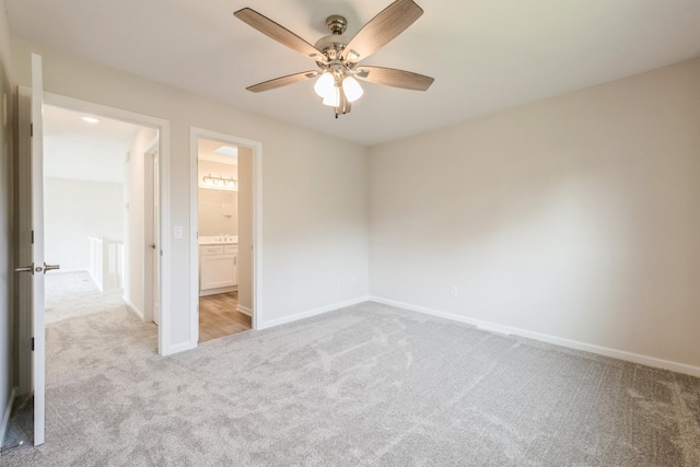 601 Harry Davis Ln, Minneapolis, MN 55411 - carpeted empty room featuring ceiling fan and baseboards