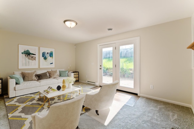 601 Harry Davis Ln, Minneapolis, MN 55411 - living area featuring baseboard heating, light colored carpet, and baseboards