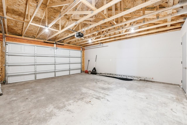 601 Harry Davis Ln, Minneapolis, MN 55411 - garage featuring a garage door opener