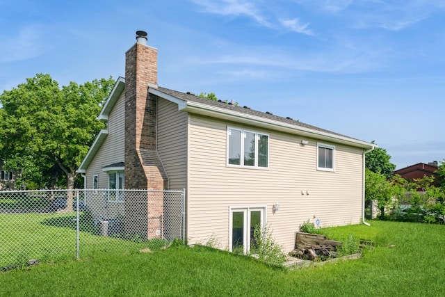 601 Harry Davis Ln, Minneapolis, MN 55411 - rear view of house with a chimney