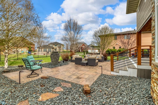 view of patio / terrace featuring fence and an outdoor living space