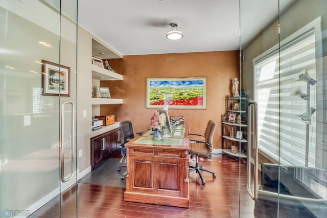 home office featuring baseboards and dark wood-style floors