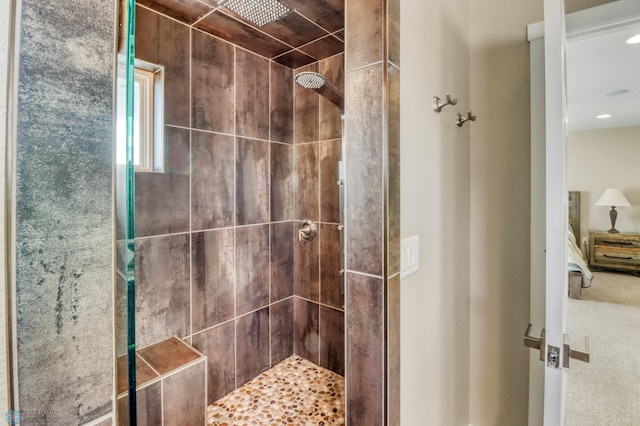 bathroom with a shower stall