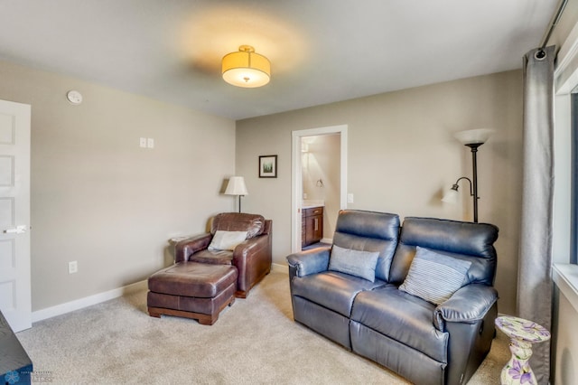 living room with carpet floors and baseboards