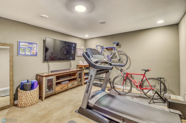 workout area with baseboards, recessed lighting, and carpet floors