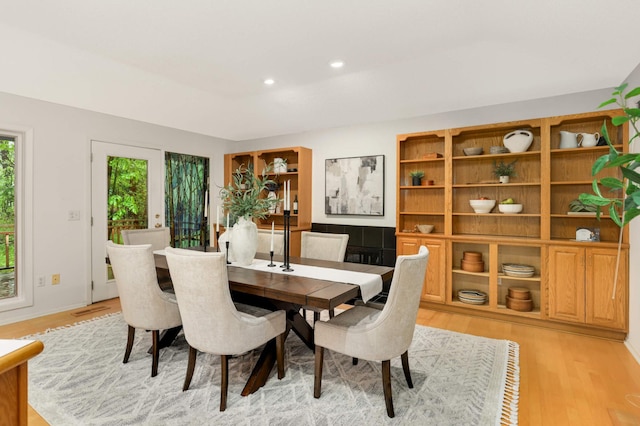 2117 Indian Rd W, Minnetonka, MN 55305 - dining space with light wood finished floors and recessed lighting