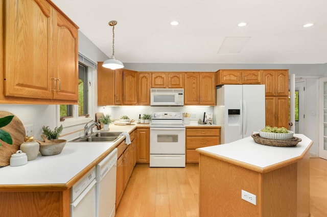 2117 Indian Rd W, Minnetonka, MN 55305 - kitchen with white appliances, a sink, light wood-style floors, light countertops, and recessed lighting