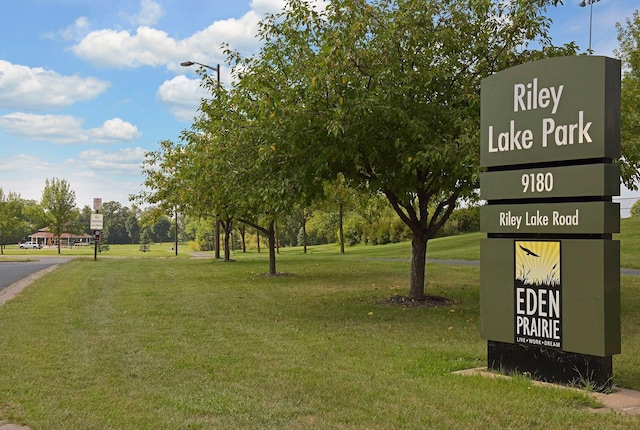 surrounding community with a yard