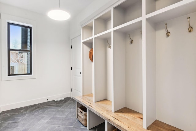 mudroom featuring baseboards