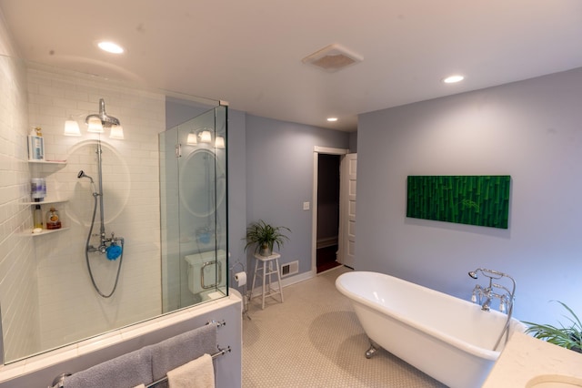 full bathroom with visible vents, recessed lighting, and a tile shower