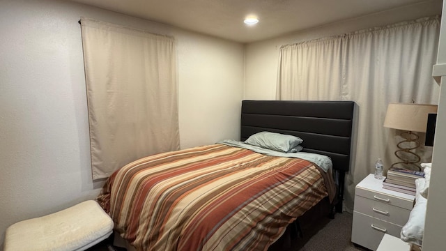 bedroom with recessed lighting