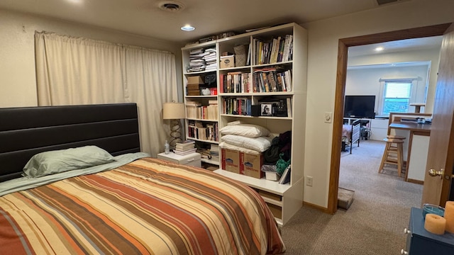 bedroom featuring carpet floors, recessed lighting, and visible vents
