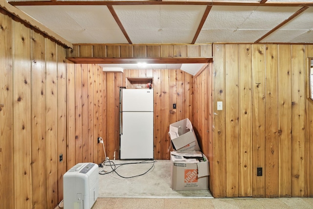 6001 Bryant Ave N, Brooklyn Center, MN 55430 - finished basement featuring freestanding refrigerator and wood walls