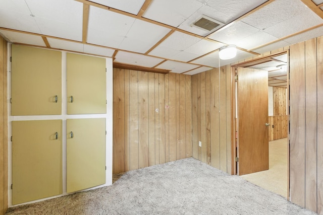 6001 Bryant Ave N, Brooklyn Center, MN 55430 - finished basement featuring carpet, wood walls, and a drop ceiling