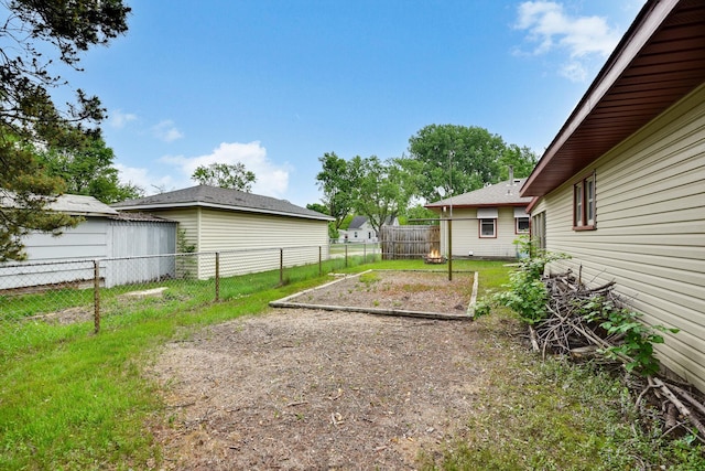 6001 Bryant Ave N, Brooklyn Center, MN 55430 - view of yard featuring a vegetable garden