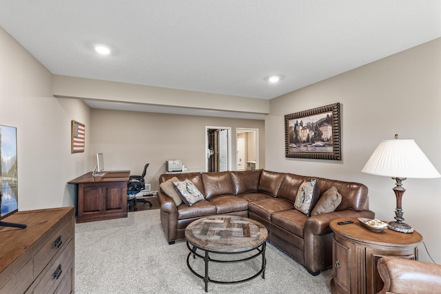 carpeted living room with recessed lighting