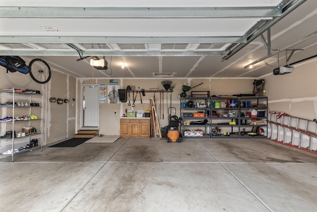 garage featuring a garage door opener