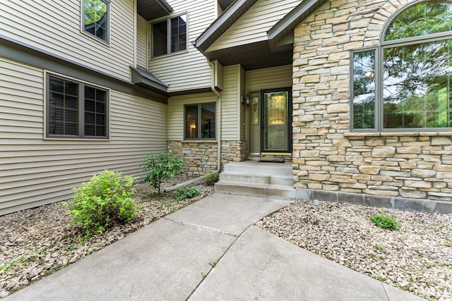 7884 341st St, Lent Twp, MN 55079 - property entrance featuring stone siding