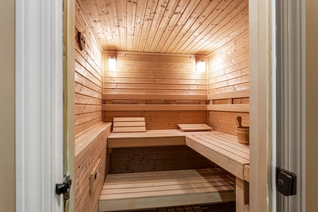 7884 341st St, Lent Twp, MN 55079 - sauna / steam room featuring wood ceiling and wooden walls