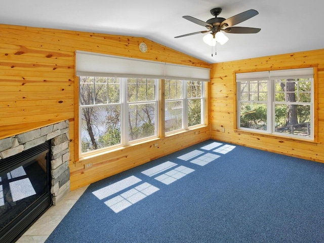 unfurnished sunroom featuring lofted ceiling