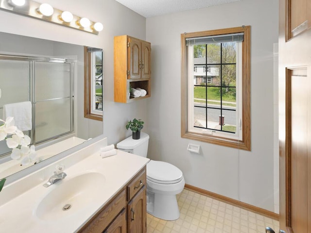 full bath with a shower with door, toilet, tile patterned floors, and vanity