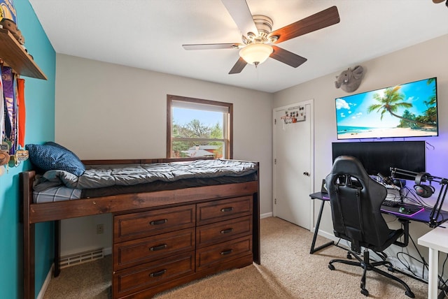 bedroom with visible vents, ceiling fan, and light carpet