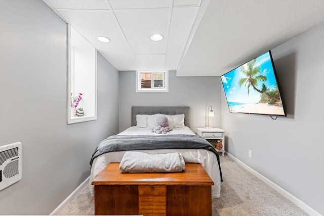 carpeted bedroom featuring recessed lighting, baseboards, and heating unit