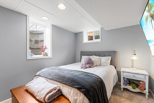 carpeted bedroom with baseboards and recessed lighting