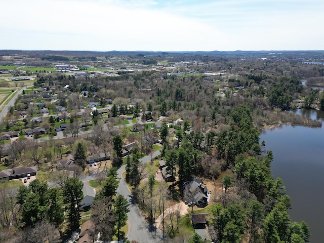 birds eye view of property featuring a residential view and a water view