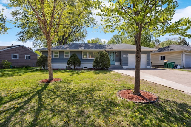 ranch-style house with an attached garage, driveway, and a front lawn