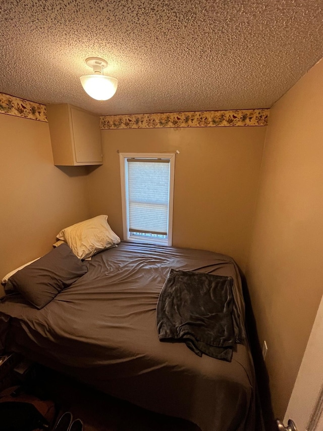 bedroom with a textured ceiling
