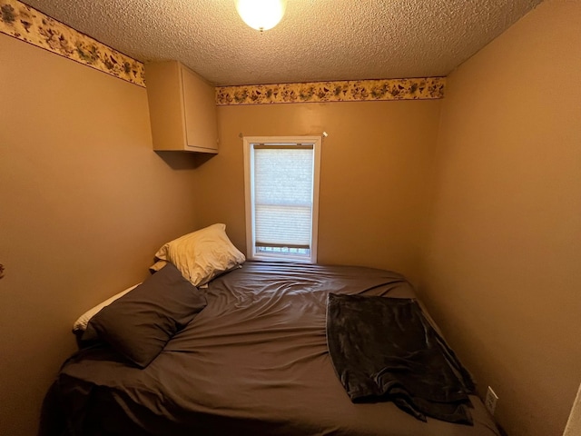 bedroom with a textured ceiling