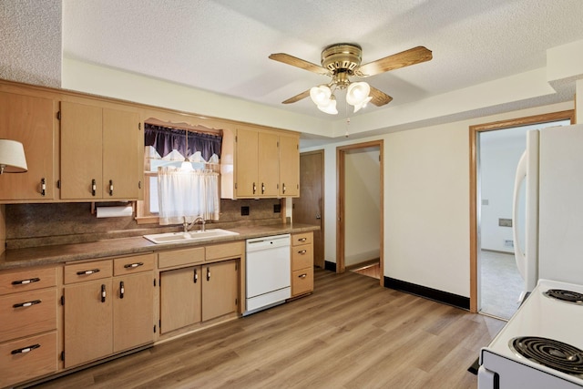 6309 Halifax Dr, Brooklyn Center, MN 55429 - kitchen featuring a ceiling fan, white appliances, light wood-style floors, tasteful backsplash, and a sink