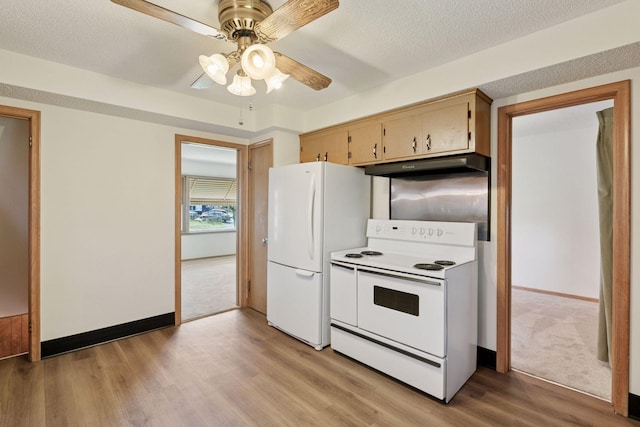 6309 Halifax Dr, Brooklyn Center, MN 55429 - kitchen featuring white appliances, baseboards, under cabinet range hood, a ceiling fan, and light wood finished floors