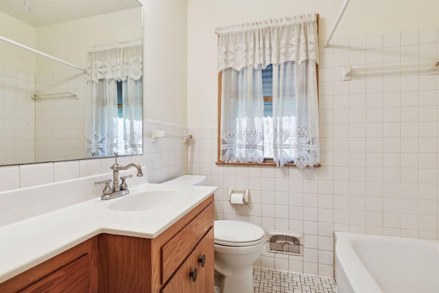 6309 Halifax Dr, Brooklyn Center, MN 55429 - full bath featuring vanity, plenty of natural light, toilet, and tile walls