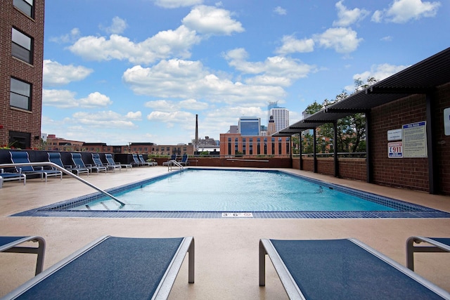 community pool with a patio
