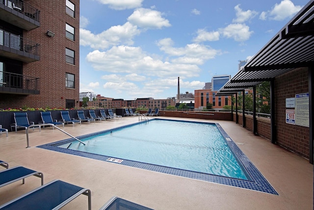 pool featuring a patio area