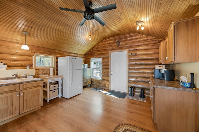 23920 Camp Dr, Daniels Twp, WI 54872 - kitchen featuring freestanding refrigerator, a sink, wood ceiling, ceiling fan, and lofted ceiling
