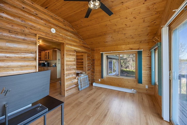 23920 Camp Dr, Daniels Twp, WI 54872 - unfurnished living room featuring a baseboard heating unit, vaulted ceiling, ceiling fan, wood ceiling, and log walls