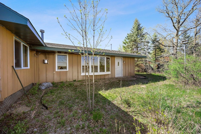 23920 Camp Dr, Daniels Twp, WI 54872 - view of property exterior with board and batten siding