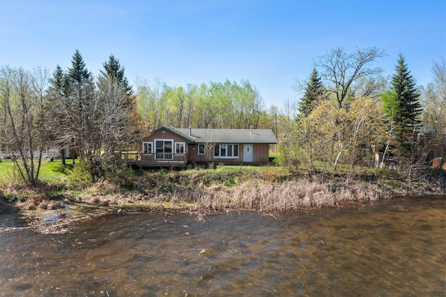 23920 Camp Dr, Daniels Twp, WI 54872 - single story home with a wooden deck