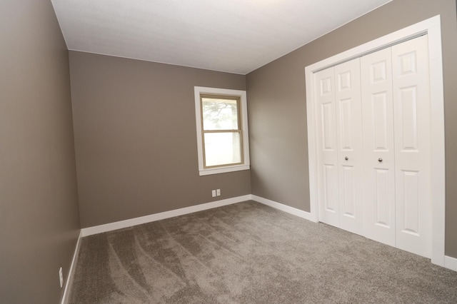 10424 Washburn Ave S, Bloomington, MN 55431 - unfurnished bedroom featuring carpet floors, baseboards, and a closet