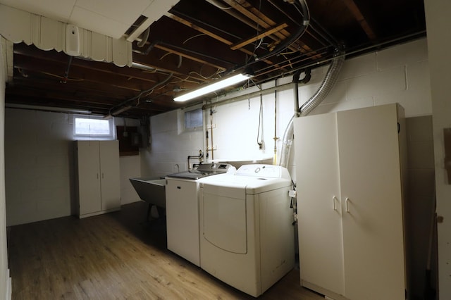 10424 Washburn Ave S, Bloomington, MN 55431 - laundry room with independent washer and dryer and light wood-style floors