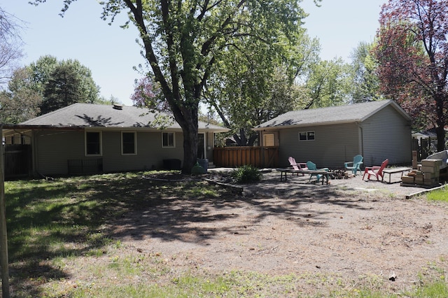 10424 Washburn Ave S, Bloomington, MN 55431 - back of house with an outdoor fire pit and a patio area
